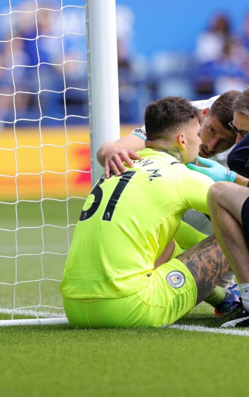 LEICESTER, ENGLAND - SEPTEMBER 11:  Ederson of Manchester City receives treatment during the Premier