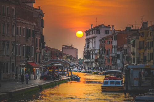 italy canal boat sunset